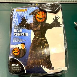 Spirit Halloween Bobble Head Pumpkin